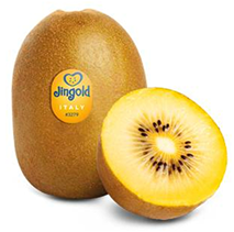 Un kiwi giallo intero e uno tagliato a metà